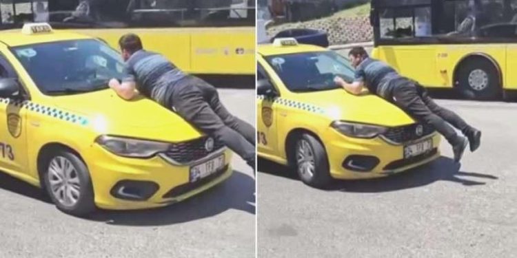 Pendik’te kazanın akabinde taksinin üstüne çıkıp camı yumrukladı