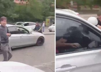 Tartıştığı motokuryeyi arabanın kaputunda sürükledi