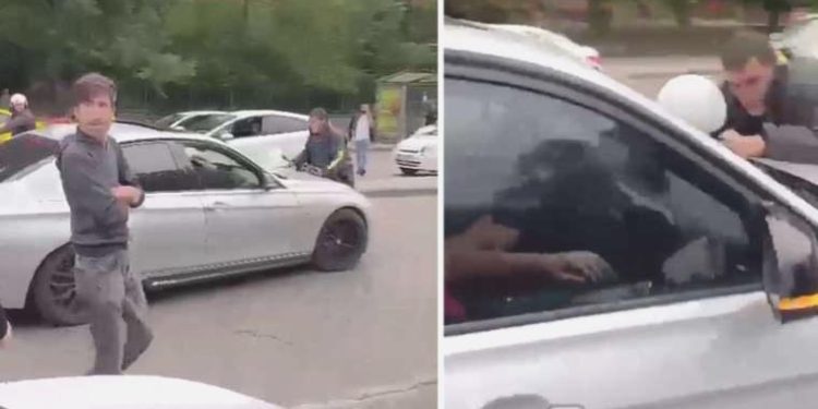 Tartıştığı motokuryeyi arabanın kaputunda sürükledi