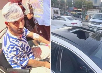 Alev alan tüpü balkondan aşağıya attı: Şoförün başına düştü