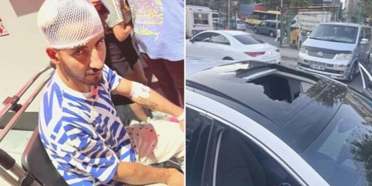 Alev alan tüpü balkondan aşağıya attı: Şoförün başına düştü